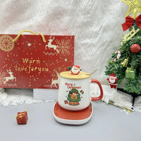 Christmas Gift Set: 55℃ Heated Ceramic Mug with Lid & Spoon - Santa Claus Design for Office or Home, Optional Portable Warmer